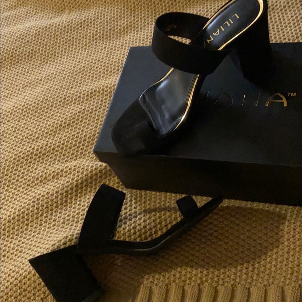 Heels! Black strap small platform heel.